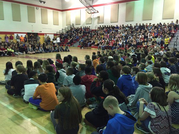 More than 900 students at Falcon Middle School gather for a pep assembly ahead of state testing.