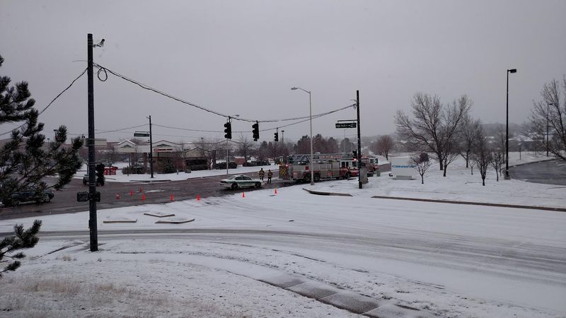 Police block the intersection of High Tech and Centennial
